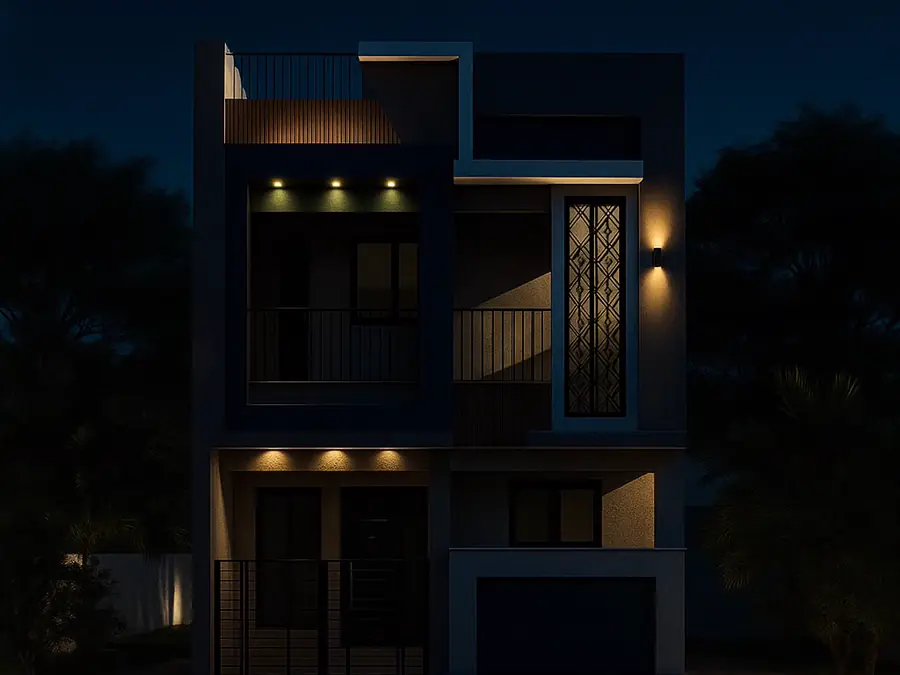Compact urban home elevation lit at night